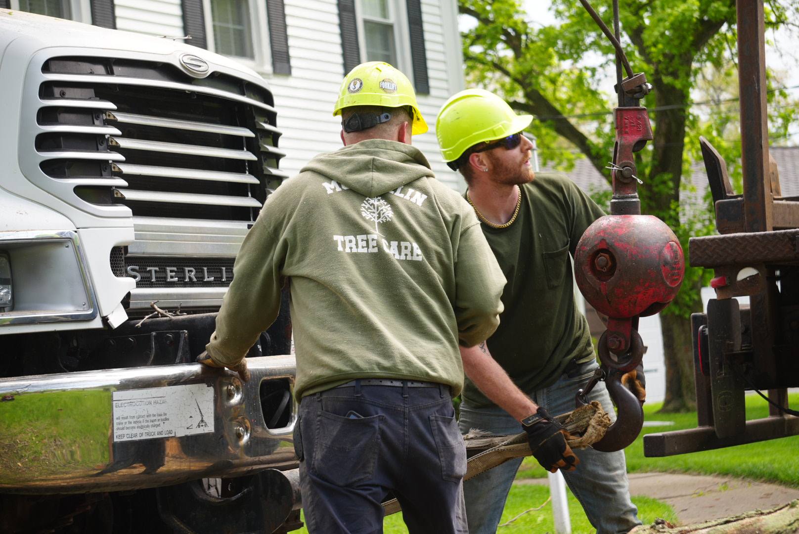 McQuillin Team holding crane ball